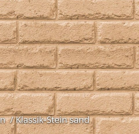 Klassik-Stein-in-sand-1024x576